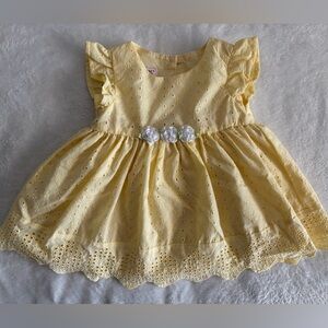 Pastel Yellow Kids Dress with Floral Accents